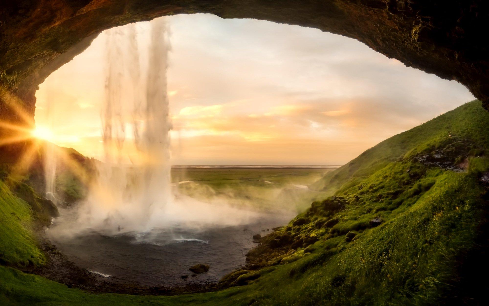 A scenic photo of a waterfall